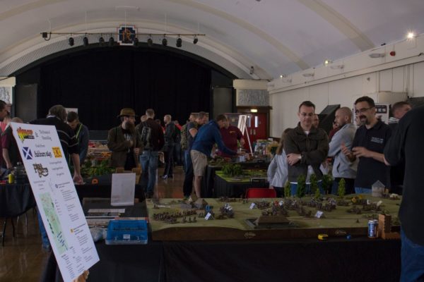 The afternoon games of the open day, showcasing the Auldearn table in the foreground. 