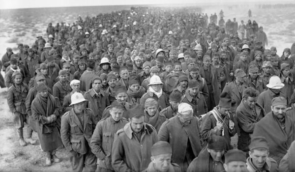 Italian prisoners marching into captivity following their defeat at Beda Fomm. Babini Group