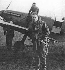 Flight Lieutenant Pat Gifford from 603 Squadron next to his Spitfire 'Stickleback' after the Forth Bridge Raid